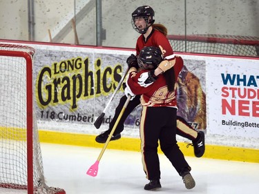 Two T-Miss players celebrate a goal against the Eastern Thunder in Broomball Canada National Juvenile Championship play on Thursday April 14, 2022 in Cornwall, Ont. The T-Miss won 3-2. Robert Lefebvre/Special to the Cornwall Standard-Freeholder/Postmedia Network