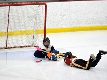 T-Miss player Camille Blais slides towards Eastern Thunder goaltender Aurora Giroux in Broomball Canada National Juvenile Championship play on Thursday April 14, 2022 in Cornwall, Ont. The T-Miss won 3-2. Robert Lefebvre/Special to the Cornwall Standard-Freeholder/Postmedia Network