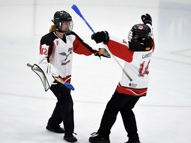 Debden Roadrunners goaltender Ayla Peterson (left) gets post-game congrats from Faith Lamotte after the team shutout Blizzard in Broomball Canada National Juvenile Championship play on Thursday April 14, 2022 in Cornwall, Ont. The Roadrunners won 4-0. Robert Lefebvre/Special to the Cornwall Standard-Freeholder/Postmedia Network