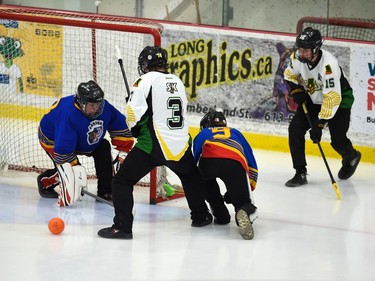 Panthers goaltender Fabien Leblanc moves to contain the ball from Bruno Axemen Carter Basset (No. 3) in Broomball Canada National Juvenile Championship play on Thursday April 14, 2022 in Cornwall, Ont. The Panthers won 2-0. Robert Lefebvre/Special to the Cornwall Standard-Freeholder/Postmedia Network