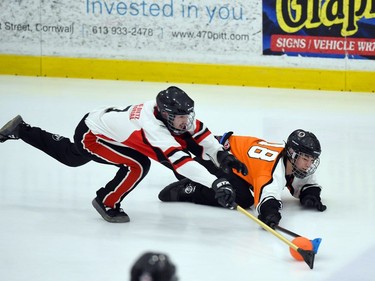 Debden Speedballs Morgan Prefontaine and Mildmay Jr. Moose Isaac Koebel both dive for the ball in Broomball Canada National Juvenile Championship play on Thursday April 14, 2022 in Cornwall, Ont. The Jr. Moose won 1-0. Robert Lefebvre/Special to the Cornwall Standard-Freeholder/Postmedia Network