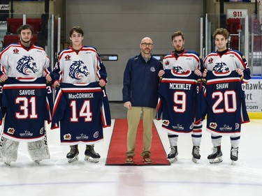 The Cornwall Colts honoured the team's 20-year-old players, from left Emile Savoie, Kale MacCormick, Wil McKinley, and Aaron Shaw, with director of hockey operations Ian Henderson, prior to the final game of the 2021-22 season against the Nepean Raiders on Saturday April 9, 2022 in Cornwall, Ont. Robert Lefebvre/Special to the Cornwall Standard-Freeholder/Postmedia Network
