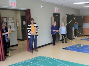 Floor shuffleboard is held Wednesday afternoons at Seniors on the Bow. Patrick Gibson/Cochrane Times