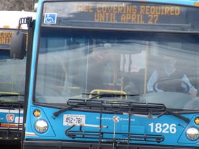 A Kingston Transit bus awaits passengers at the Cataraqui Centre in Kingston.