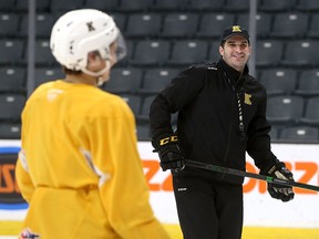 Kingston Frontenacs head coach Luca Caputi talks to players during practice at the Leon's Centre on April 13.