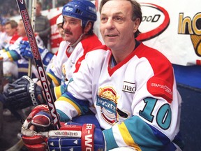 Former National Hockey League great Guy Lafleur takes a break while playing in an oldtimers hockey game at the Civic Centre in Ottawa on Jan. 16, 2000.