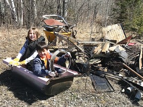 Photo supplied
Two young Massey area children show the garbage they collected on Earth Day 2020.