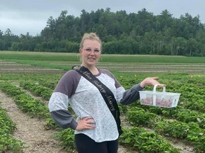 Montana wearing her sash in the strawberry fields at Emiry’s Farm, Massey.