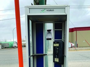 The telephone booth by the community centre, just off Highway 2 southbound.