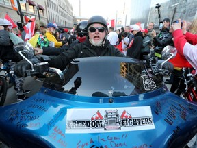 "Rolling Thunder Ottawa" convoy participants and supporters in downtown Ottawa on Friday.