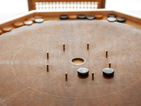 Playing Crokinole will be an option for those attending the open house at the 50+ Active Living Centre on April 8.