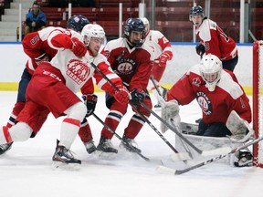 Pembroke Lumber Kings' forward Carter Vollett goes hard to the net looking for the loose puck in front of Ottawa Junior Senators' goalie Zachary Bowen during third period action at the PMC April 3. Ottawa beat Pembroke 3-1.