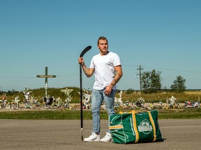 Kaleb Dahlgren stands at the intersection where the Humboldt Broncos team bus collided with a semi-trailer on April 6, 2018 in a horrific crash that killed 16 people and seriously injured 13 more. The picture appears in Dalhgren's new book, 'Crossroads.'
