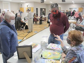 Artist Robin Knox, right, of Robin's Nest Arts chats with 50+ Active Living Centre members Linda Lapierre and Dick Knox during a Fun Day at the centre held on April 8. Robin is the instructor of the beginner's water colours class that begins on Friday, April 22 at the centre. Anthony Dixon