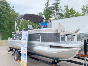 The Pembroke Regional Hospital Foundation's Spring Lotto for Healthcare launches April 21 at 10:30 a.m. The grand prize draw is for a 2022 Princecraft pontoon boat with trailer and motor from RG Dick Plummer Marine. In the photo is Roger Martin, hospital foundation executive director, and one of the sponsors, Lindsey Cupelli of The Mortgage Advisors. Submitted photo