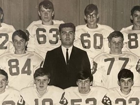 Coach Ray Donnelly with the junior football team in 1967-68. Submitted