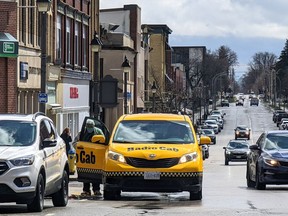 Pictured, a Radio Cab taxi drops off a passenger in downtown Stratford. (Galen Simmons/Beacon Herald file photo)