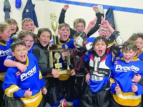 Prouse Motors Rangers of the Soo Pee Wee Hockey League's under 11 A division celebrate their championship. The Rangers needed a fourth overtime period to edge S&T Group in the title tilt. HOCKEY NEWS NORTH