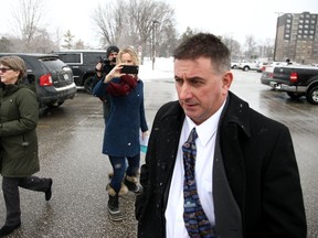 Former Canadian Gymnastics coach Dave Brubaker, leaves the courthouse after being found not guilty of charges against him in Sarnia, Ont. on Wednesday, Feb. 13, 2019.