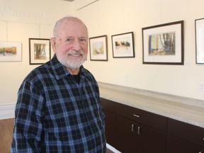 Jack Keefe stands in the Turret Room at the Lawrence House Centre for the Arts in downtown Sarnia where his solo watercolour show, Nature's Reflections, runs through April 30.