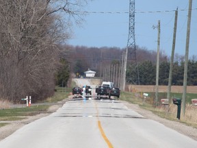 OPP vehicles are shown Thursday near the Marthaville Habitat Management Area near Petrolia on a section of Marthaville Road police closed for a death investigation that is being treated as a homicide.