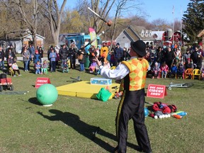 Jonathan Seglins, as Circus Jonathan, juggles fire for the crowd Saturday at Sarnia's Easter in the Park at Canatara Park.