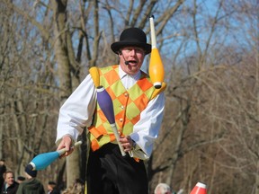 Jonathan Seglins, as Circus Jonathan, juggles for the crowd Saturday at Sarnia's Easter in the Park at Canatara Park.