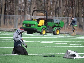 Work continues on the installation of artificial turf on a new playing field at Great Lakes secondary school on Murphy Road in Sarnia. The project, which also includes an eight-lane track, is expected to be completed by early June.