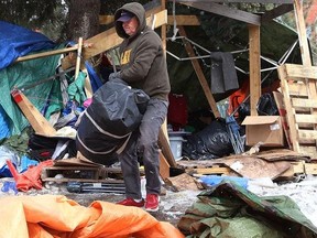 A structure was dismantled at an encampment at Memorial Park in Sudbury, Ont. on Friday April 1, 2022.