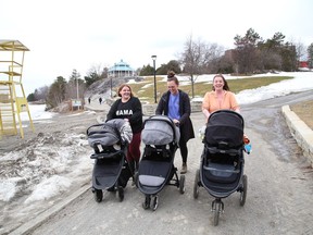 Hayley Lafrance, left, Emily Chabot and Chelsea Katerynuk go for a walk with their babies at Bell Park in Sudbury, Ont. on Tuesday April 5, 2022. John Lappa/Sudbury Star/Postmedia Network