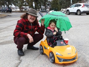 Wesley Rose took his granddaughter, Ella, 2, for a ride at Bell Park in Sudbury, Ont. on Friday April 8, 2022. John Lappa/Sudbury Star/Postmedia Network