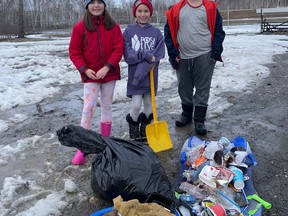 Brielle Bankie, Devyn Aubin and Tyson Aubin (from left to right) recently went to work on a cleanup of the old Inco ballfield in Garson. Supplied