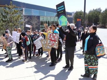 Participants take part in an Earth Day Climate March as part of year two events for the United Nations Decade of Restoration at Laurentian University in Sudbury, Ont. on Friday April 22, 2022. John Lappa/Sudbury Star/Postmedia Network