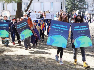 Participants take part in an Earth Day Climate March as part of year two events for the United Nations Decade of Restoration at Laurentian University in Sudbury, Ont. on Friday April 22, 2022. John Lappa/Sudbury Star/Postmedia Network