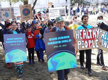 Participants take part in an Earth Day Climate March as part of year two events for the United Nations Decade of Restoration at Laurentian University in Sudbury, Ont. on Friday April 22, 2022. John Lappa/Sudbury Star/Postmedia Network