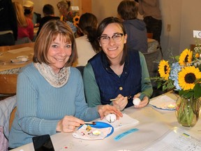 Mother and daughter Ann and Maggie Lynch participated in one of The Painted Cat's Cat Cabajar's Ukrainian Easter egg decorating class at St. George's Ukrainian Catholic Church on April 2, part of the Pysanky and Perogies fundraiser for Ukraine. Carl Hnatyshyn/Sarnia This Week