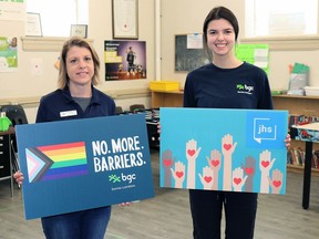 BGC Sarnia-Lambton's Lisa Lanouette and Lambton College social work placement student Madison Lowe hold up a pair of anti-racism/inclusivity signs developed by local youth.
Carl Hnatyshyn/Sarnia This Week