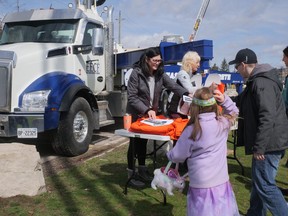 East Elgin Concrete Forming brought a big truck – and a lot of free T-shirts to give away Saturday during the Tillsonburg Kinsmen Easter Egg Hunt. (Chris Abbott/Norfolk and Tillsonburg News)