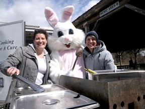 Tillsonburg Kinettes Ashley Edwards and Debbie Peever barbecued Saturday for the Easter Egg Hunt. (Chris Abbott/Norfolk and Tillsonburg News)