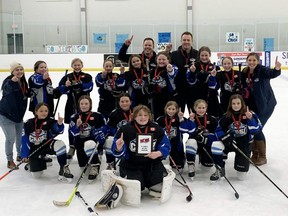 The Chatham-Kent U11 C Crush are the 2021-22 Group A champions in the Western Ontario Girls Hockey League. Team members are, front row: Jules Authier. Second row, left: Jordyn Brown, Hannah Heinhuis, Taylor Jones, Sienna Fraser, Jillian Tope and Brylee Ovecka. Third row: coach Alena Fiala, Kendall Dietrich, Emmerson DeNure, Stella Vandehogen, Jada Brown, Jemma Johnson, Brooklyn Pearce, MacKenna DeMaeyer and coach Destiny Johnson. Back row: coach Randy Dietrich and head coach Mike Pearce. (Contributed Photo)