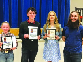 Hannah Miller, Cale Warren and Autumn Clark, pictured with Josh Cookson, the Get-A-Way Youth Centre's  program manager, are this year's recipients of the Leaders of Tomorrow Awards.
