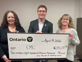 EMC Project Coordinator Susan McLachlan (left), EMC Vice President and General Manager Amanda Doman (right) and Bruce-Grey-Owen Sound MPP Bill Walker pose with a cheque for over $2.8 million to help expand skills and development training programs offered by the Owen Sound headquartered manufacturing consortium. Photo supplied