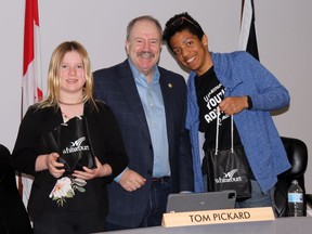 Tehya Ophus, left, and Josiah Moore, right, received their prizes for being named Mayor for a Day and spending Monday with Mayor Tom Pickard.