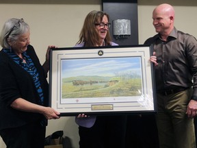 Camrose RCMP Cpl. Kevin Krebs presented Wetaskiwin and District Victim Services board president Jeannie Blakely and executive director Petra Pfeiffer on behalf of the Wetaskiwin and Camrose RCMP detachments and RCMP K Division to mark the unit's 25th anniversary last week.
Christina Max