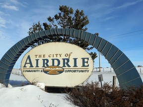 A sign greeting travellers to the community of Airdrie, Alta, is shown northbound on Hwy 2 QE II, on Tuesday January 14, 2014. Jim Wells/Calgary Sun/QMI Agency ORG