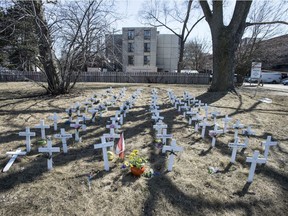 Crosses of remembrance for loved ones lost to the COVID-19 at Camilla Care Community Mississauga Long-Term Care home in March 2021.