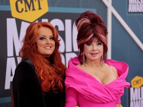 Wynonna Judd and Naomi Judd attend the 2022 CMT Music Awards at Nashville Municipal Auditorium on April 11. (Photo by Mike Coppola/Getty Images)