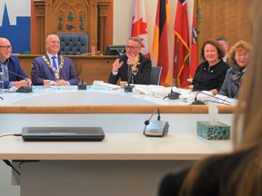 Belleville hosted twin-city Lahr, Germany, officials in a luncheon Wednesday to mark a cultural exchange visit to the city. Officials shared a laugh in City Hall council chambers including, from left, Coun. Chris Malette, Coun. Sean Kelly, Mayor Mitch Panckiuk, Lahr Lord Mayor Markus Ibert, Friederike Ohnemus and Coun. Stefanie Kremling-Deinert. DEREK BALDWIN