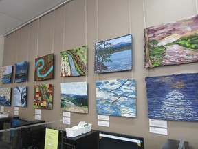 the pieces of art being hung at the North Norfolk Library. (supplied photo)