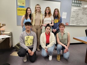 The John Maland High School’s Claw Crew gathered to prepare for Hygiene for Hope, the group’s health product drive, on April 28. Back, from left: Darcie Pollock, Sam Brown, Mariana Bruin, Abby Campbell. Front, from left: Rio McDougall, Dahlia Rahime, Autumn Houle. Not pictured: Hayley Campbell. (Dillon Giancola)